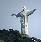 Christ the Redeemer statue in Rio de Janeiro, Brazil. It is made of reinforced concrete clad in a mosaic of thousands of triangular soapstone tiles. O Cristo Redentor.JPG