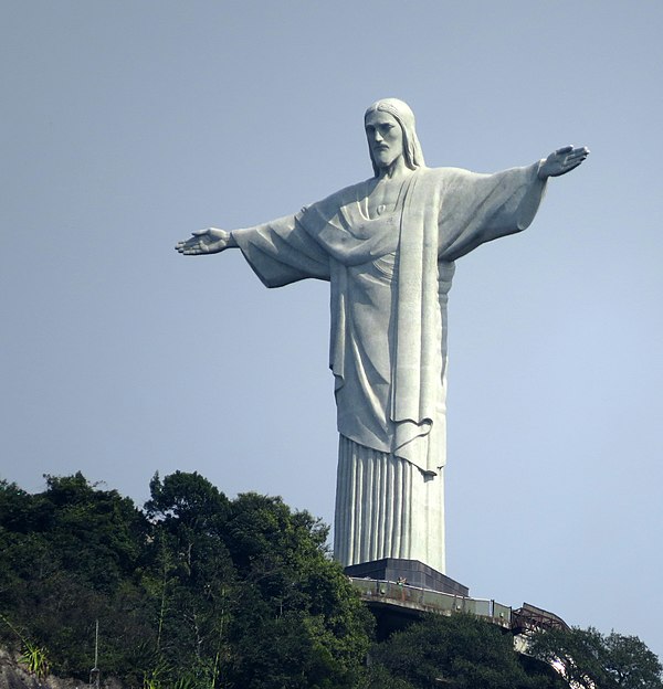 Christ the Redeemer statue in Rio de Janeiro, Brazil. It is made of reinforced concrete clad in a mosaic of thousands of triangular soapstone tiles.