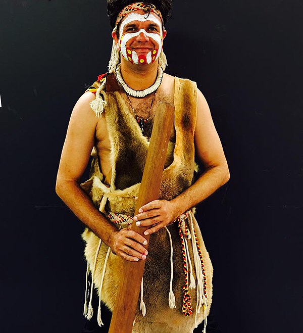 Olman Walley, a Noongar performer, in traditional Noongar clothing