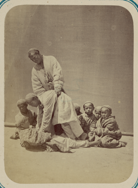 File:Pastimes of Central Asians. A Young Man Teaching Younger Boys How to Wrestle WDL10813.png