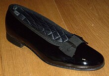 A men's court shoe (or opera pump), in patent leather, worn with white tie or black tie attire. Patent court shoes.jpg