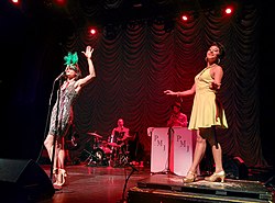 Ariana Savalas and Sarah Reich perform "Bad Romance" by Lady Gaga at The Regency Ballroom in San Francisco. Postmodern Jukebox 2015-06-20 Ariana Savalas and Sarah Reich.gk.jpg