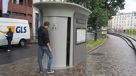 Unisex public toilet on a street in Paris, France