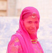 A Hindu woman with a ghoonghat veil. Rajasthan Girl Traditional Dress.jpg