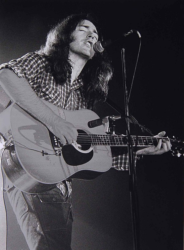 Gallagher on acoustic guitar, March 1978