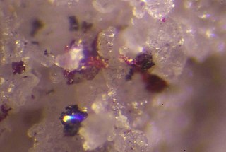 <span class="mw-page-title-main">Routhierite</span> Rare thallium sulfosalt mineral