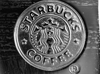 https://upload.wikimedia.org/wikipedia/commons/thumb/0/06/STARBUCKS_logo_%28monochrome%29.jpg/320px-STARBUCKS_logo_%28monochrome%29.jpg