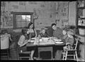 Scott's Run, West Virginia. Employed miner's family - Sessa Hill - This picture was taken at the natural supper hour.... - NARA - 518391.jpg