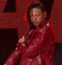Shinsuke-nakamura-looks-determined-during-his-entrance-at-an-nxt-event.jpg