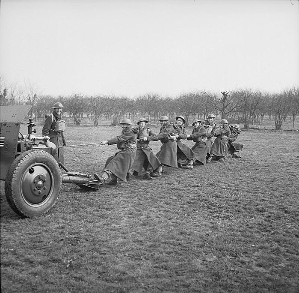 Men from Bolton Wanderers Football Club serving together with a battery of artillery in the 53rd (Bolton) Field Regiment, Royal Artillery, of the 42nd