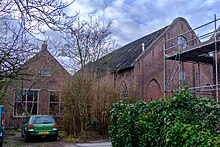Voormalige gereformeerde kerk met verenigingsgebouw(?) aan de Rijksweg 197 in Ten Post. Gebouwd in 1870 in neogotische stijl naar ontwerp van Kornelis Huizinga en Pieter Post.