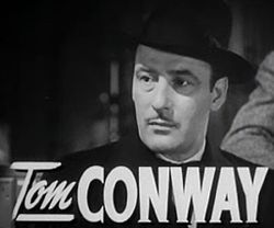 Tom Conway i rollen som Frankie Ciro i Mordet på centralen från 1942.