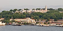 A view of Topkapi Palace, the inner core of which was built in 1459-1465, from across the Golden Horn, with the Prince Islands in the background Topkapi - 01.jpg