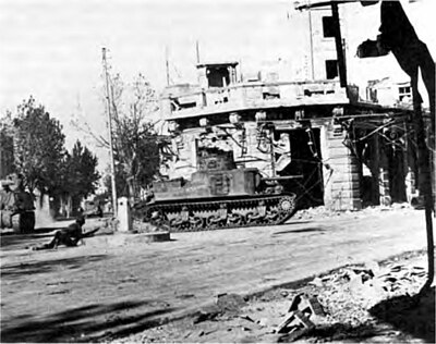 American tanks and infantry in Bizerte. (DA photograph)