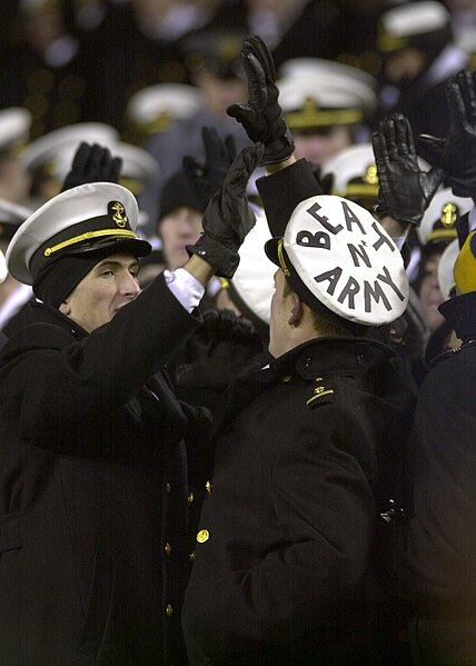 File:US Navy 031206-N-9693M-519 U.S. Naval Academy Midshipmen high-five each other to celebrate a Navy play during the 104th Army Navy game.jpg