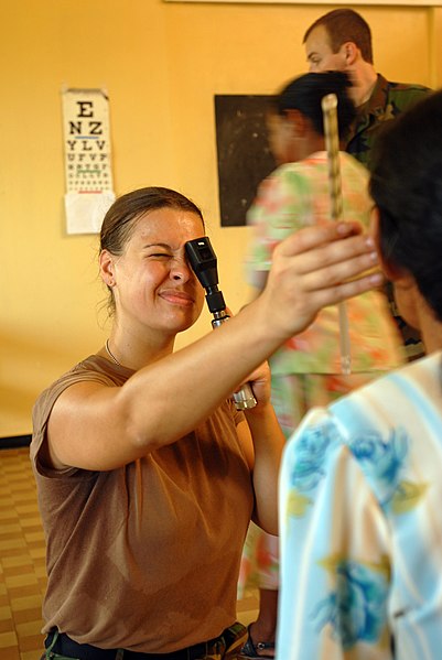 File:US Navy 081111-N-3595W-170 Lt. Megan Rieman gives eye exams to patients at Kumaka District Hospital.jpg