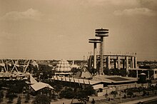 The New York State Pavilion during the 1965 season of the World's Fair. The Tent of Tomorrow and observation towers can be seen at right. Several other pavilions are visible to the left.