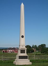 July 3 Monument to the 1st Minn. Reg., the Codori farmstead behind 1MN July3 Mon.jpg