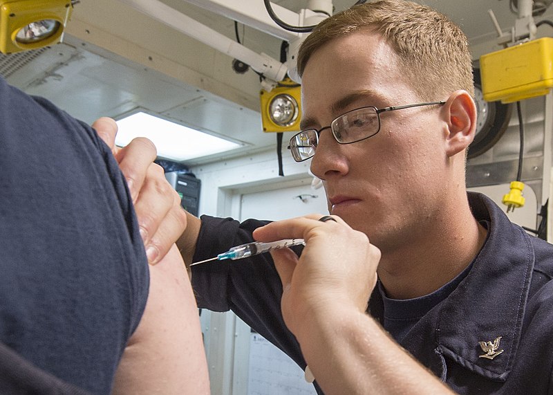 File:A corpsman gives vaccines. (21387634436).jpg