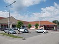 Agora Shopping Center, west wing in Gyömrő, Hungary.jpg
