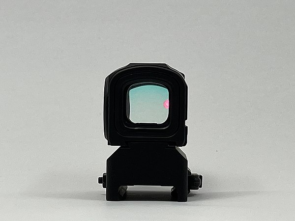 Reflex sights have varying dot viewing angles; that is the maximum angle the operators eye can be offset from the center-axis of the sight whilst the 