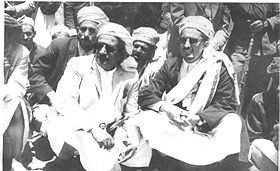 Former sheikh of Hashid sheikhs, Abdullah al-Ahmar (right) in 1965 Al-Ahmar 1965.jpg