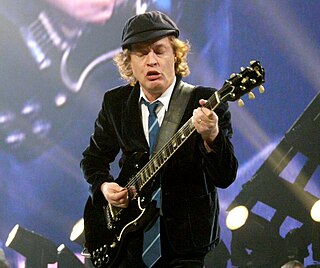 Angus Young Australian lead guitarist of AC/DC