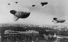 Barrage balloons flying over central London Barrage balloons over London during World War II.jpg