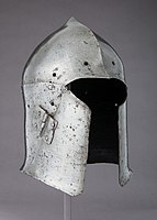 Italian bascinet c. 1400. It has a single hinged cheekpiece, and its type may have had some influence on the development of the armet.