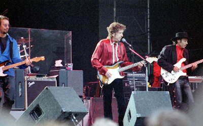 (From left to right) John "J.J." Jackson, Dylan and Tony Garnier performing in Stockholm, Sweden, July 27, 1996