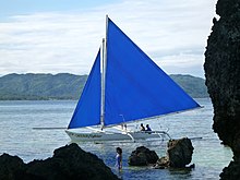 A paraw in Boracay, Philippines, with the double-outriggers typical of Southeast Asian proas Boracay paraw sailboats 010.jpg