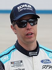 Brad Keselowski, NASCAR driver and winner of the 2012 NASCAR Sprint Cup Series and 2010 NASCAR Nationwide Series Brad keselowski (52046420990) (cropped).jpg