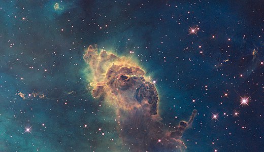 Composed of gas and dust, the pictured pillar resides in a tempestuous stellar nursery called the Carina Nebula, located 7500 light-years away in the southern constellation of Carina.