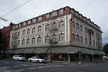 Shleifer Furniture building at 509 S.E. Grand Ave, Portland, Oregon, 2013 Chamberlin Hotel.jpg