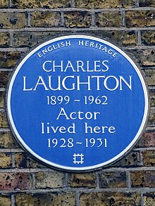 English Heritage blue plaque erected in 1992 at 15 Percy Street, London commemorating Charles Laughton. Charles Laughton 1899-1962 Actor lived here 1928-1931.jpg