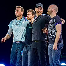 Coldplay is considered to be the most successful British rock act of the decade. Coldplay 2017, cropped 01.jpg