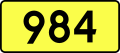 English: Sign of DW 984 with oficial font Drogowskaz and adequate dimensions.