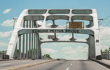 Edmund Pettus Bridge, heading out of downtown Selma, across the Alabama River, towards Montgomery. Pettus was a Confederate brigadier general, and later Grand Dragon of the Alabama Ku Klux Klan. Edmund Pettus Bridge, Selma, Alabama (27609419870).jpg