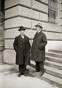 Beck (left) and Emil Beck in front of the Federal Palace of Switzerland, 1920. Emil Beck & Wilhelm Beck Bundeshaus.jpg