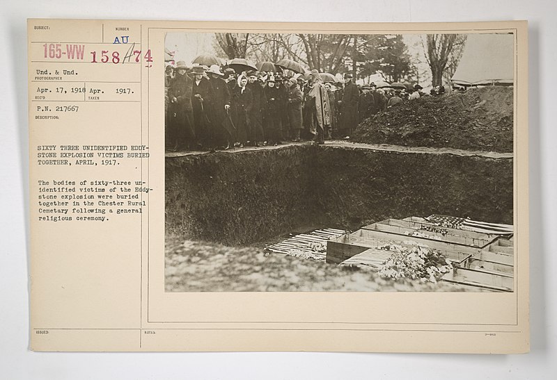 File:Enemy Activities - Destruction by Enemy in U.S. - Sixty three unidentified Eddystone explosion victims buried together, April 1917. The bodies of sixty-three unidentified victims of the Eddystone explosion were b(...) - NARA - 31478193.jpg