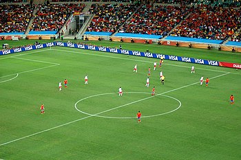 Spanish (in red) midfield position against Switzerland (in white) at the World Cup in 2010. FIFA World Cup 2010 Spain Switzerland midfield.jpg