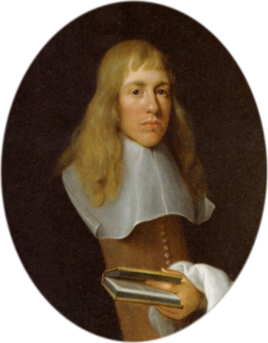 A man with long fair hair in 17th century dress