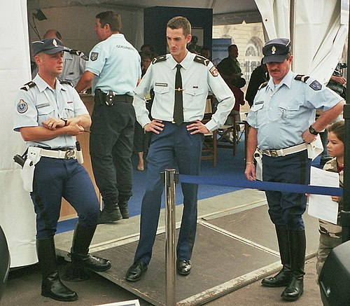 Four Departmental Gendarmes with a former uniform