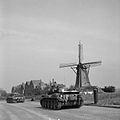 Cromwell tanks of Guard's Armoured Division drive along 'Hell's Highway' towards Nijmegen during Operation 'Market-Garden', 20 September 1944