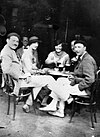 Ernest Hemingway seated in 1925 with the persons depicted in The Sun Also Rises