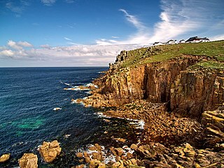 <span class="mw-page-title-main">Headland</span> Landform extending into a body of water, often with significant height and drop