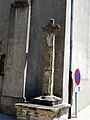 Le Chastang croix devant église.JPG