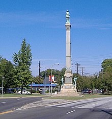 Louisville's former 70-foot-tall Confederate Monument, adjacent to and surrounded by the University of Louisville Belknap Campus. Due to political pressures, the monument was relocated to Brandenburg in 2016. Lou Confed South.jpg