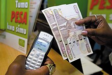 Image showing an individual using the M-PESA mobile money transfer. M-Pesa on Nokia 1100 20120430.jpg