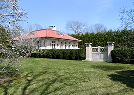 A garden gate and guest house.